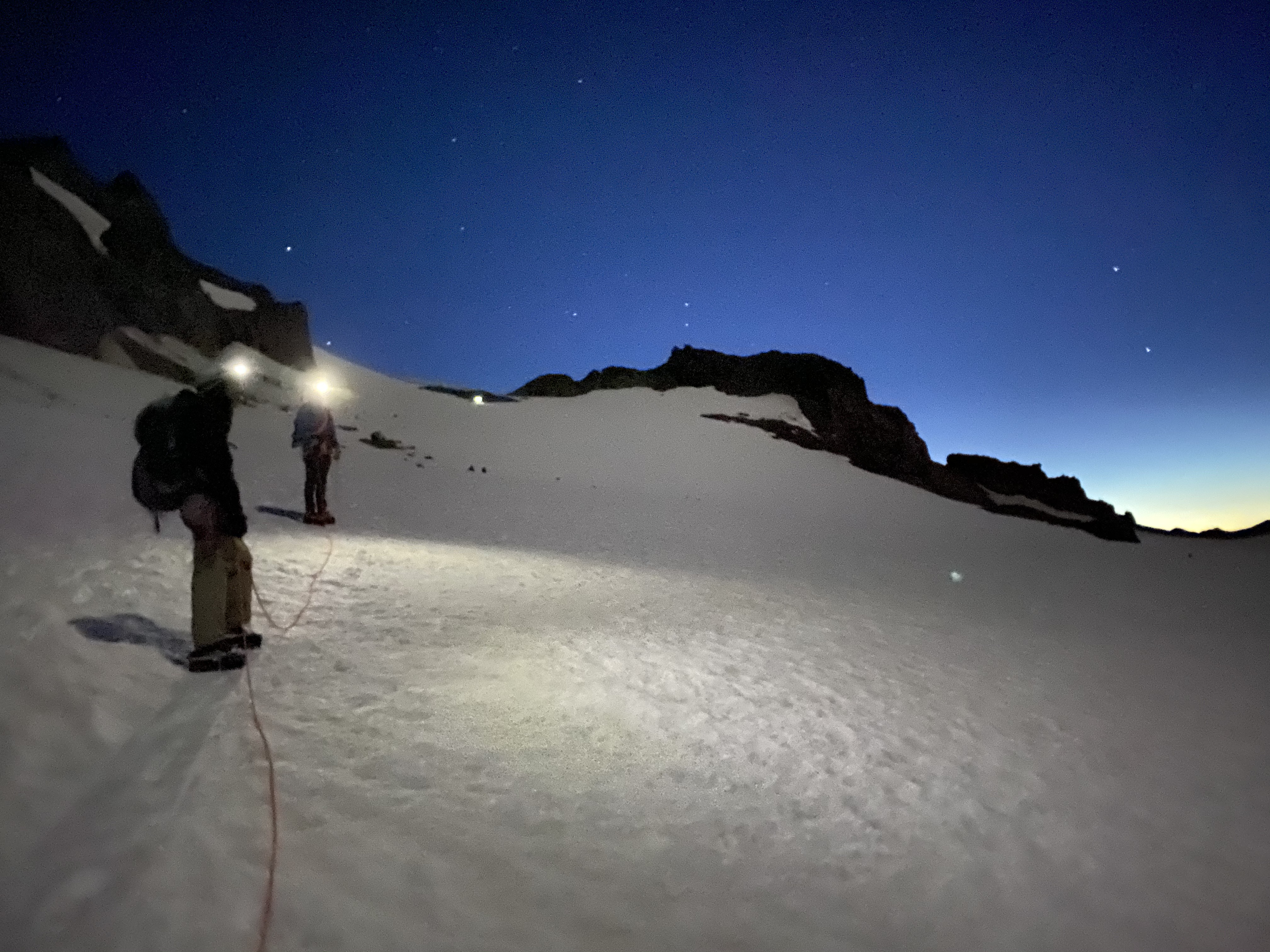 Gregory and Non on the glacier in moonlight.