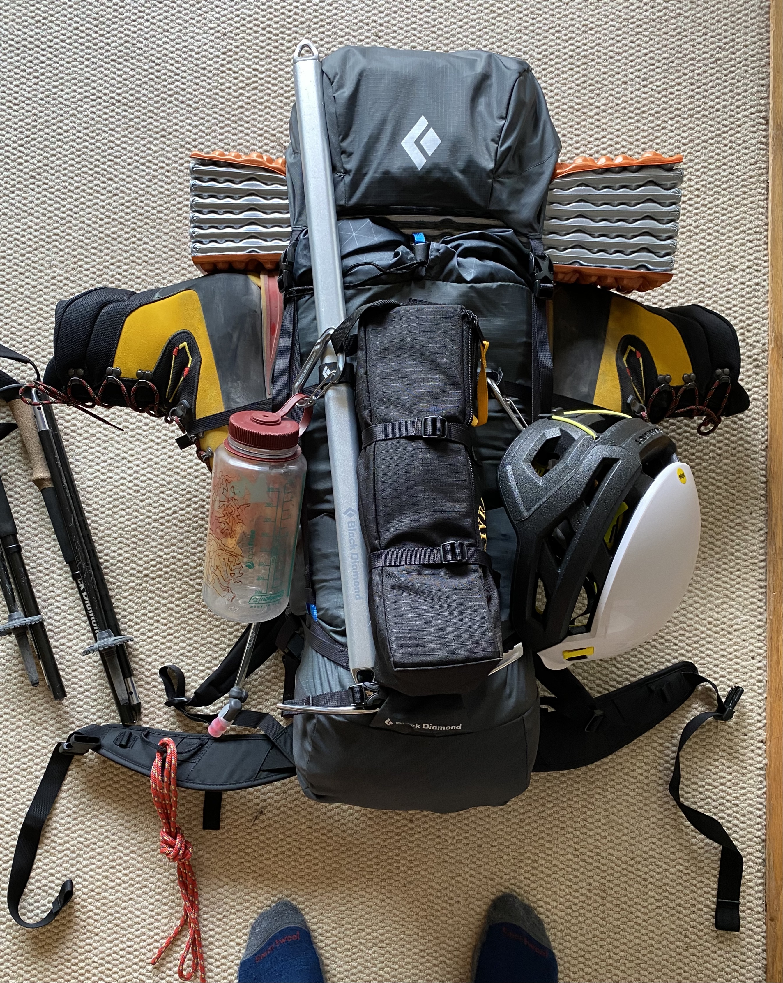 A 30L pack overloaded with climbing gear.