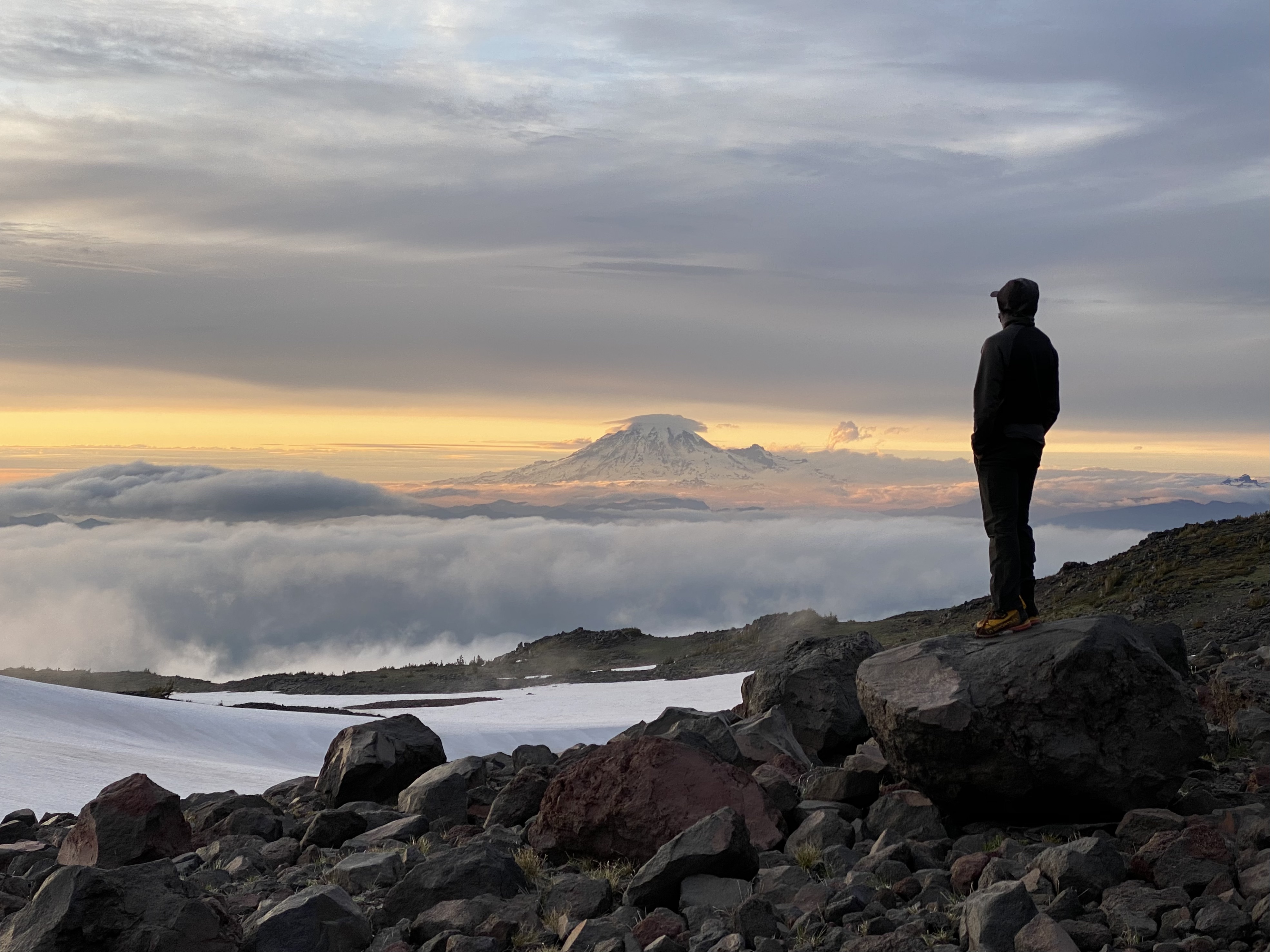 Yoshio and a view of Mount Rainier as the sun sets.