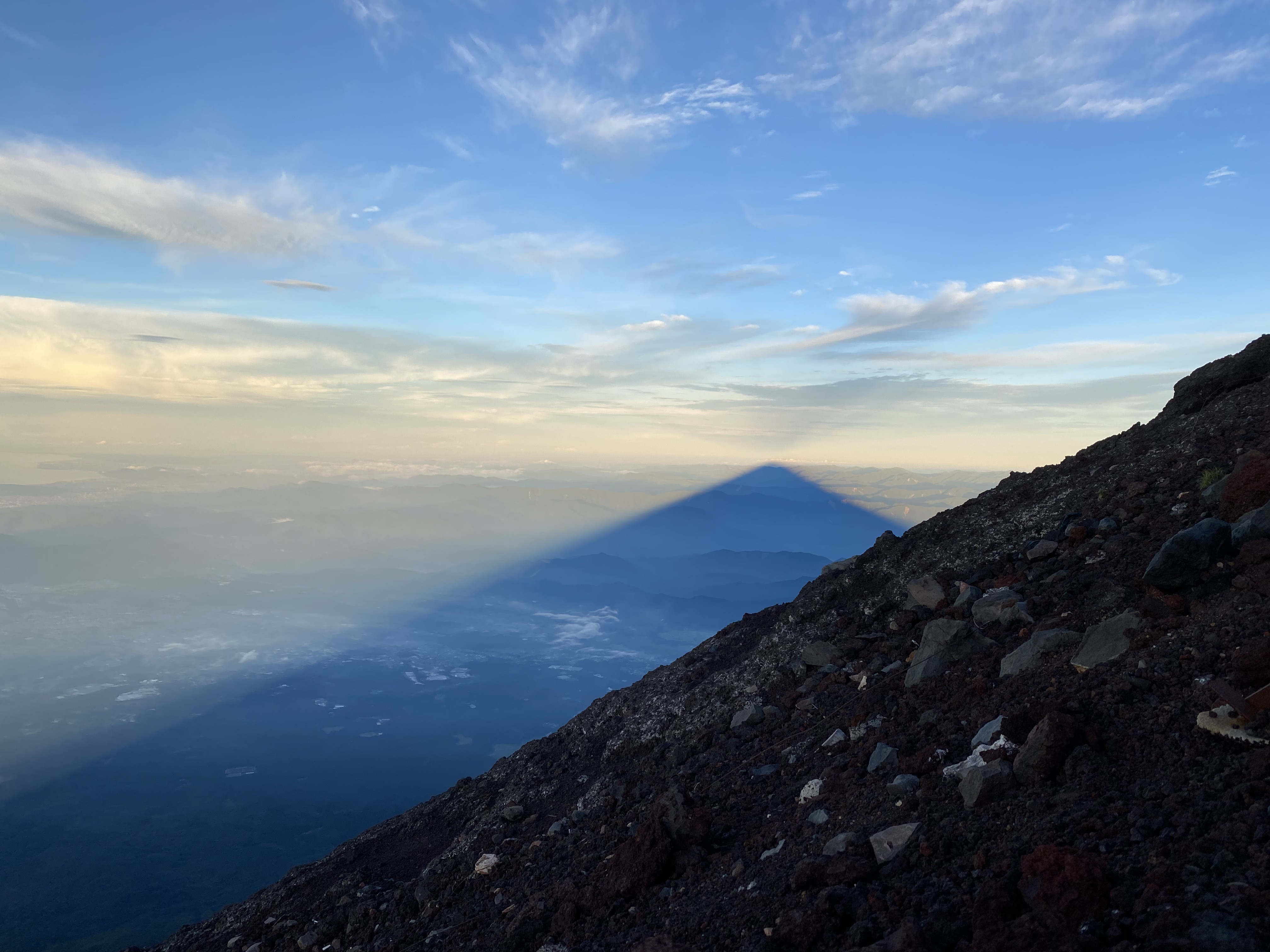 Fujisan's shadow in the distance.