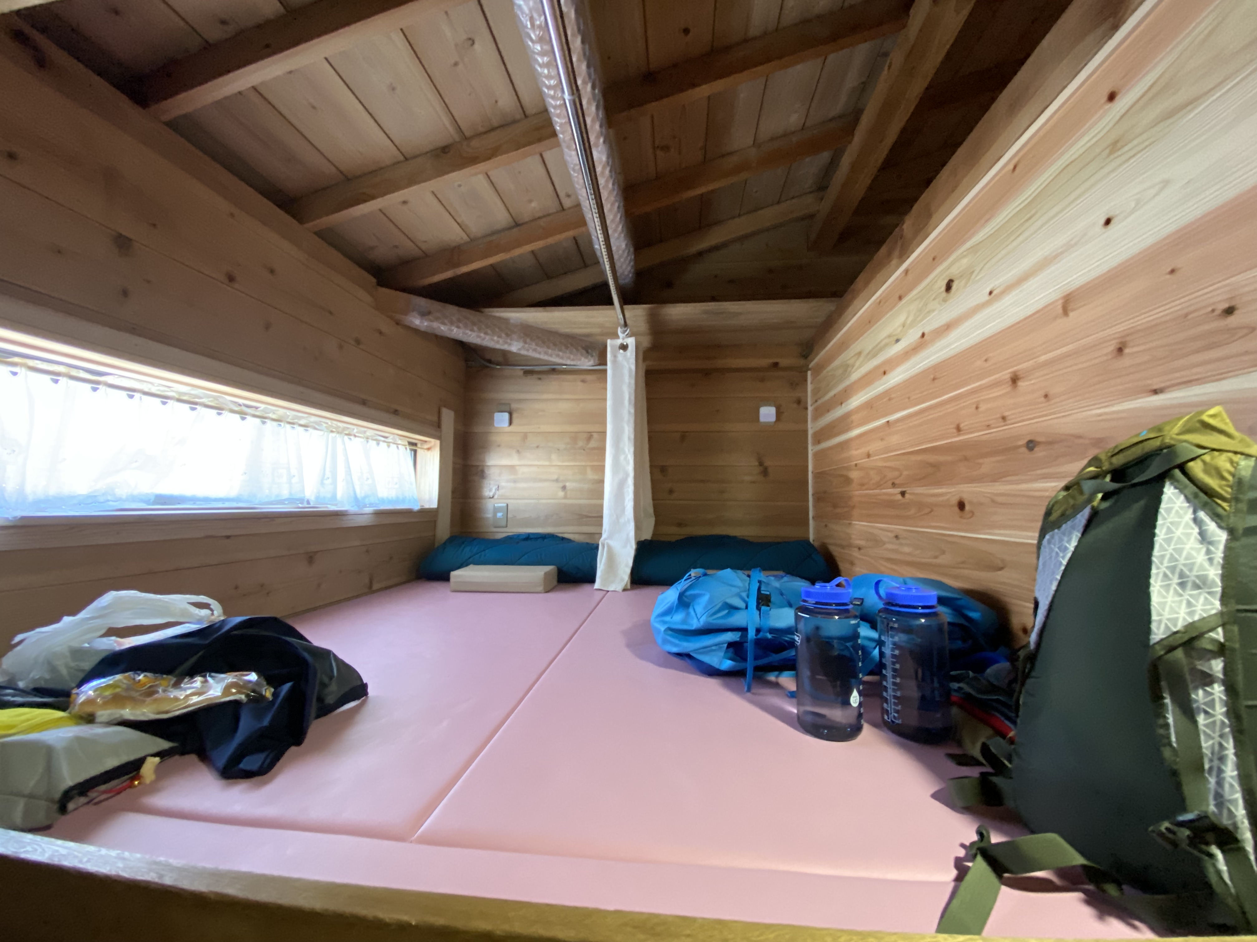 Yoshio and Takuma's beds at Horaikan in a dormitory style room.