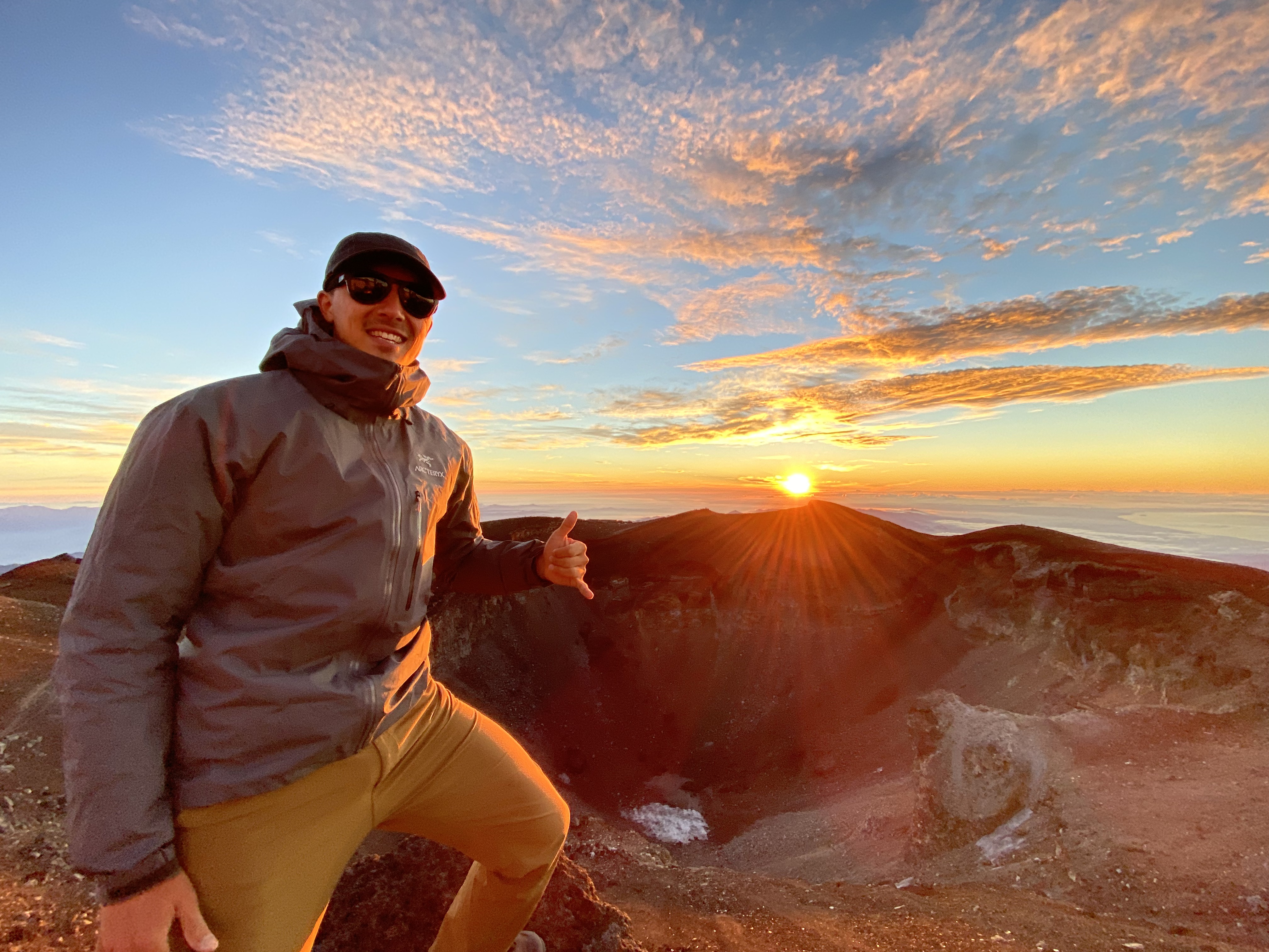 Me with the sunrise from the summit of Fujisan.