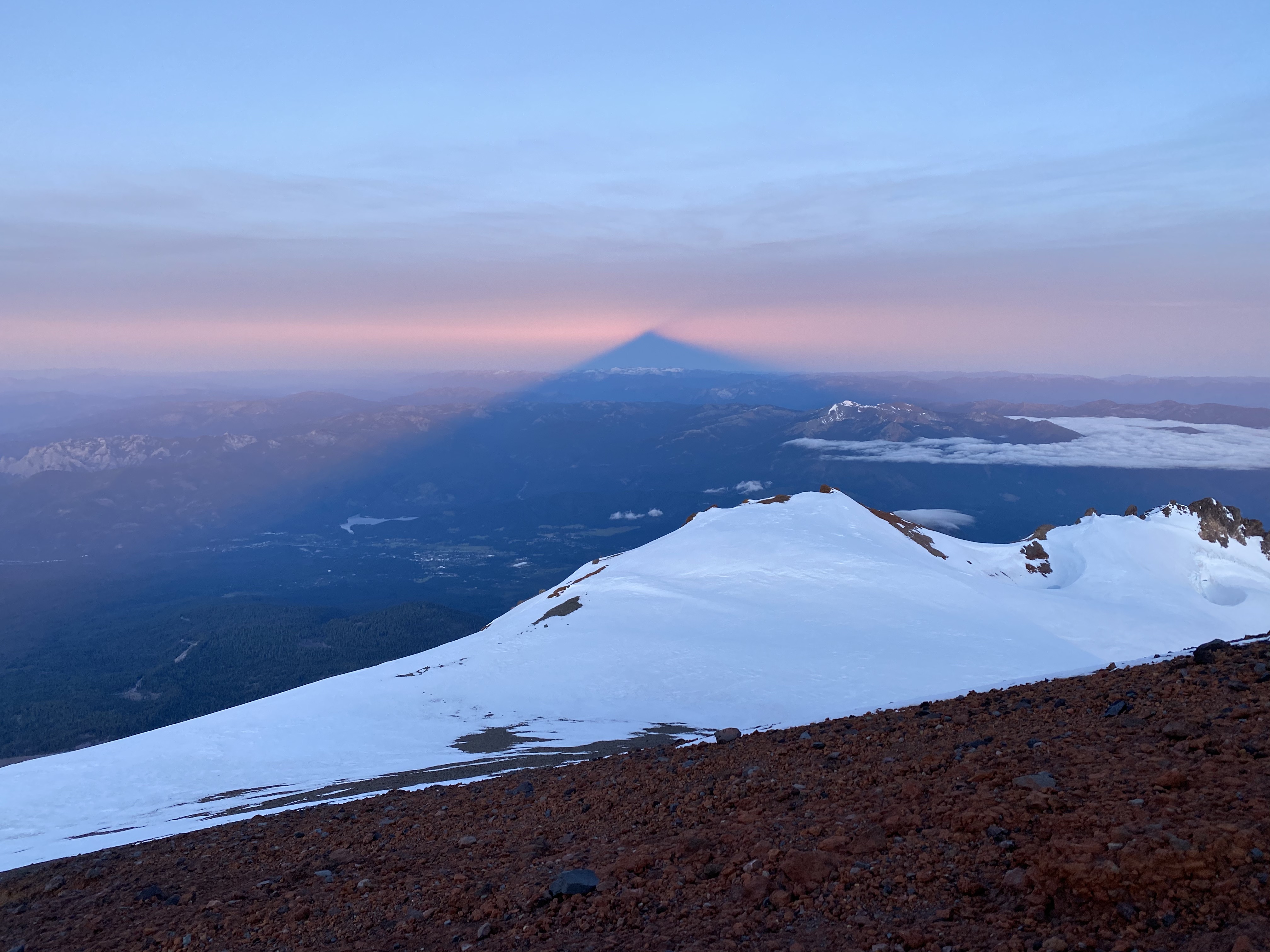 The shadow of Mount Shasta in the distance.