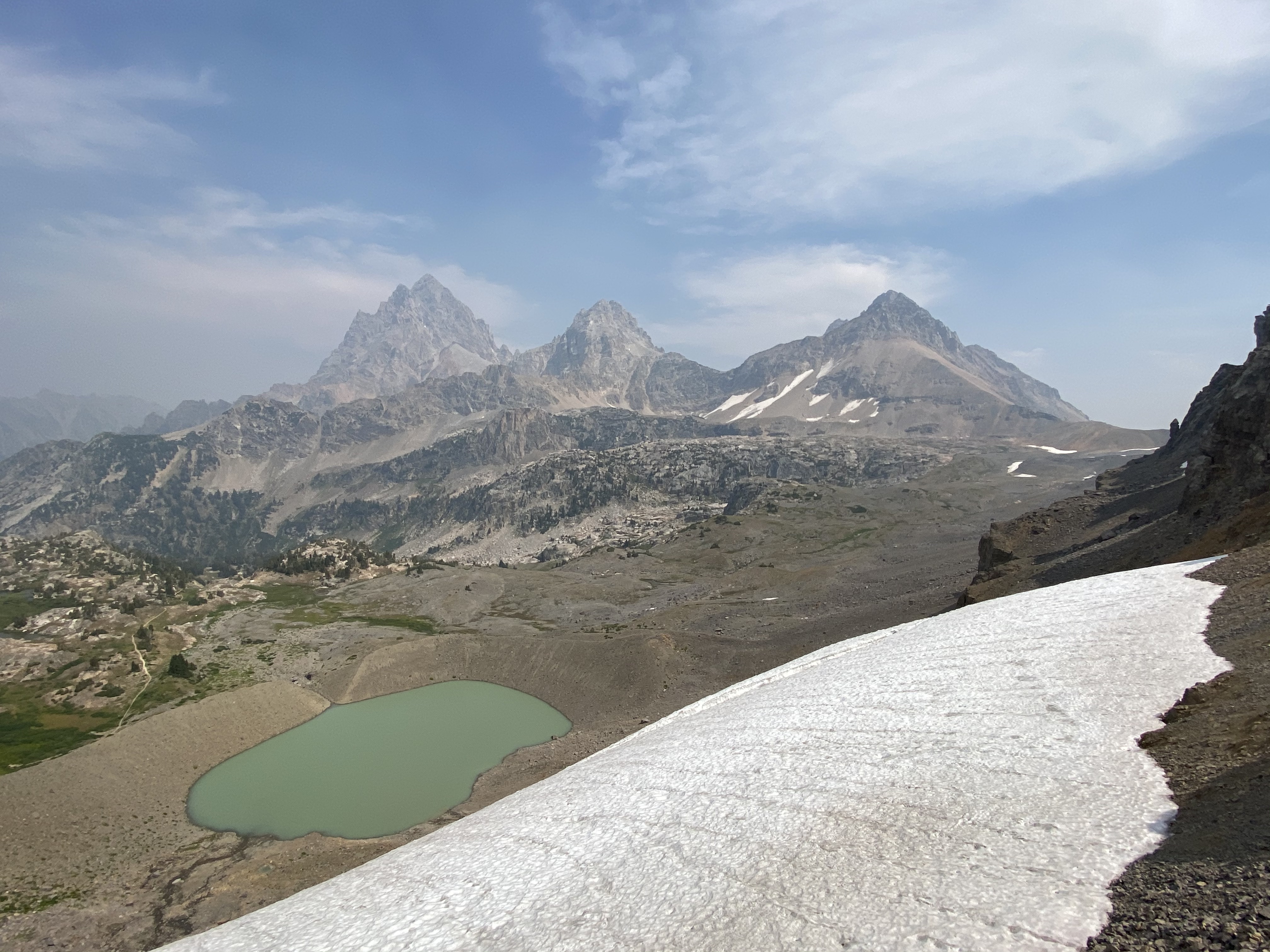 A view of Schoolroom Glacier with Grand, Middle and South Teton in the background.